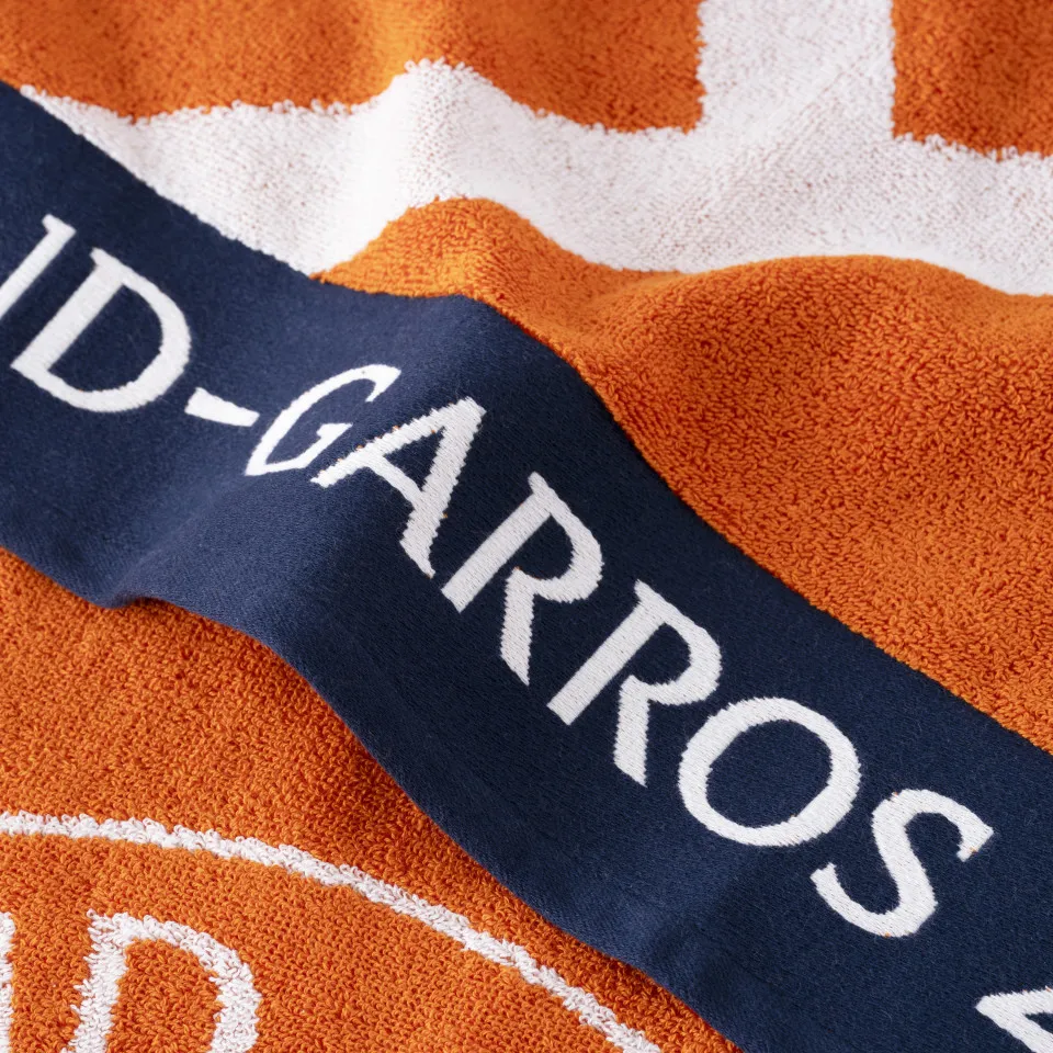 1743580386-serviette-de-toilette-coton-bio-joueur-se-roland-garros-2025-terre-battue